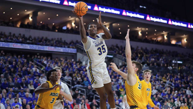 South Dakota State forward Douglas Wilson (35) shoots a layup during the second half against North Dakota State in NCAA college basketball game for the Summit League men’s tournament championship Tuesday, March 8, 2022, in Sioux Falls, S.D.
